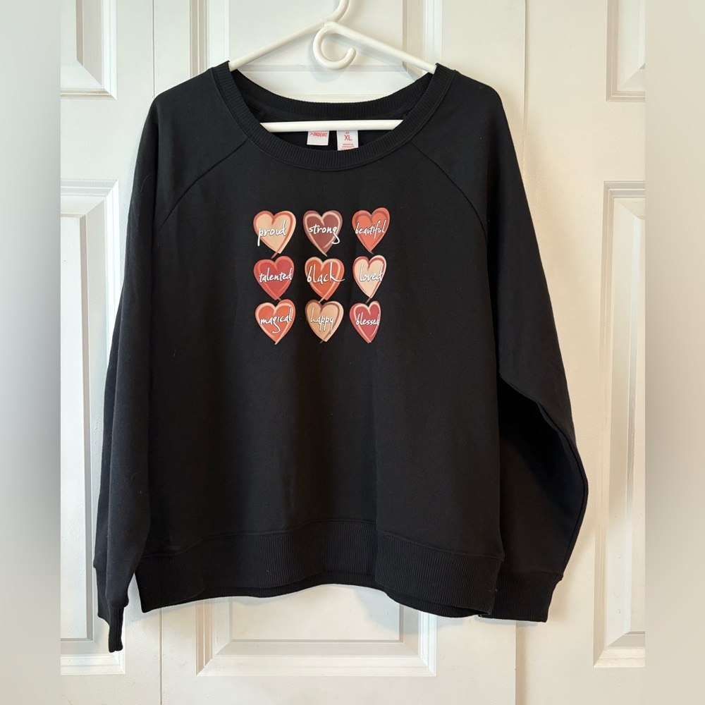 Indent sweatshirt with Heart Graphics.